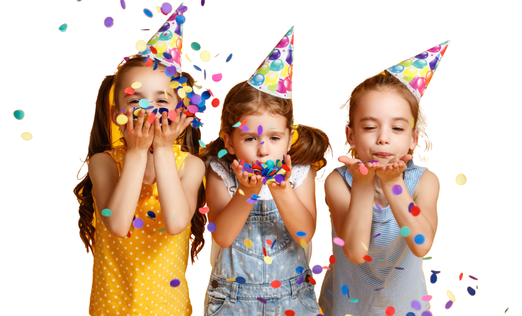 Three girls in birthday hats with confetti