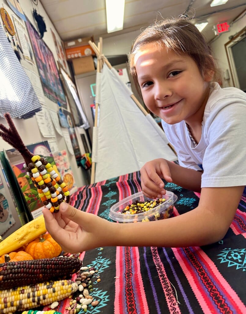 Slate Tiger, a Sand Springs student, learns about Native foods and stories in teacher Stacy Clipp’s class.