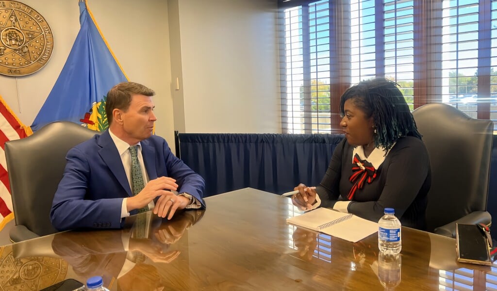 Interim Oklahoma State Superintendent Lindel Fields talks with Dr. Tamecca Rogers during a recent interview.