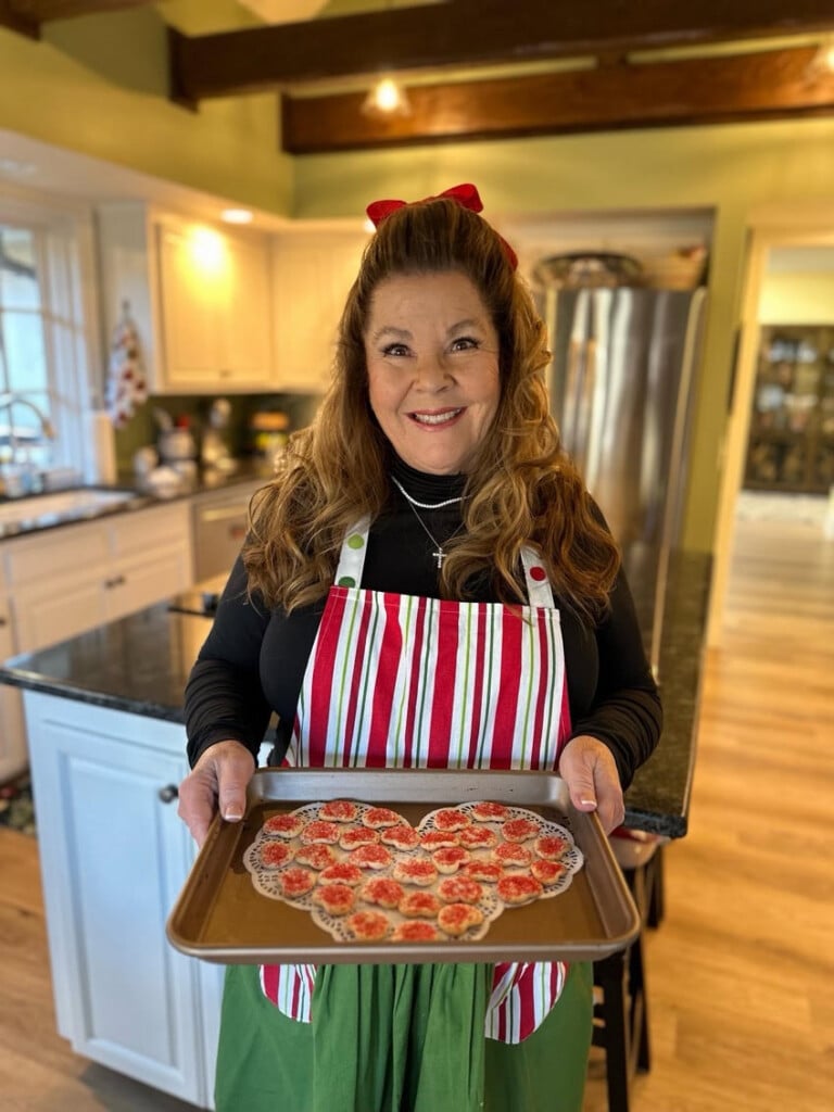 Brittany Greenwood holds a plate of homemade cookies