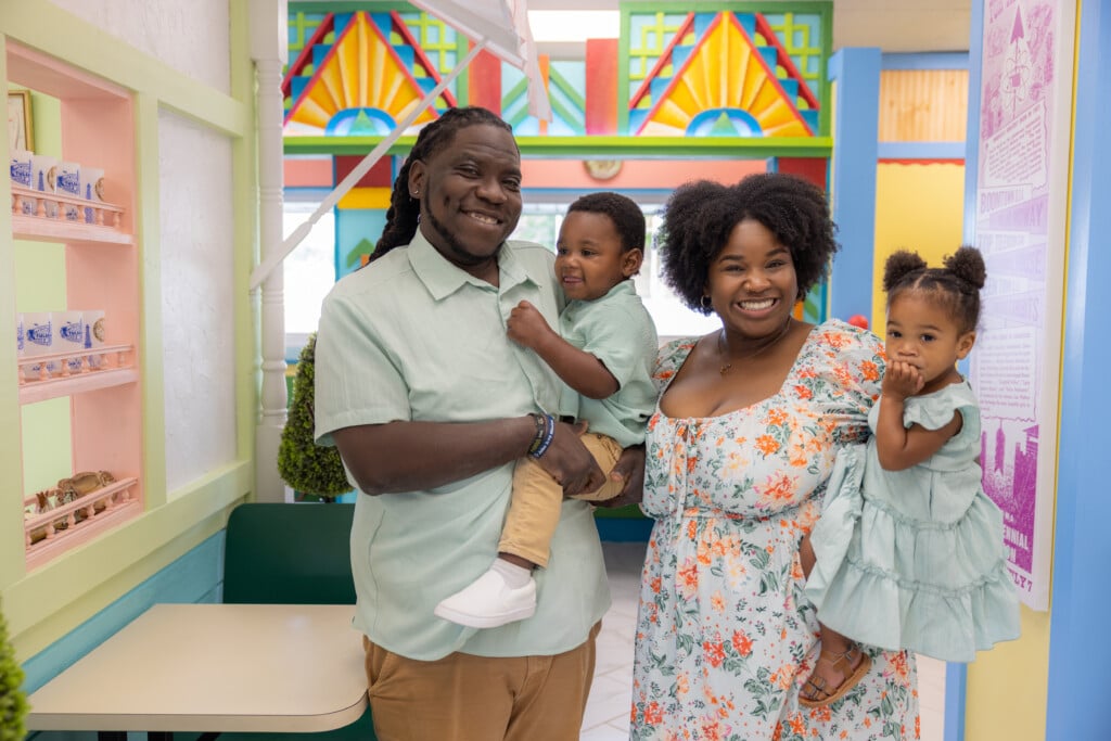 Virgil Savage with his wife, Tori, and their children.