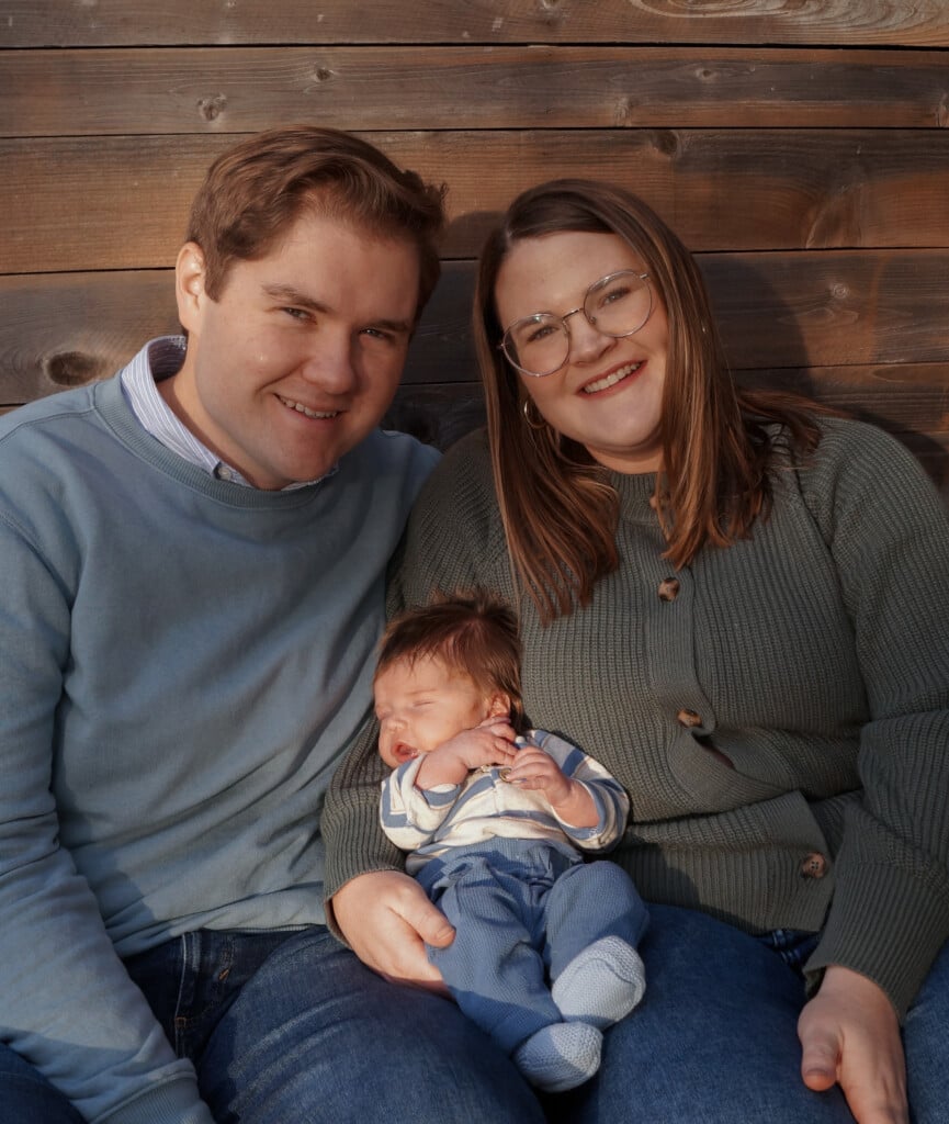 Maggie Sharum, her husband and newborn baby