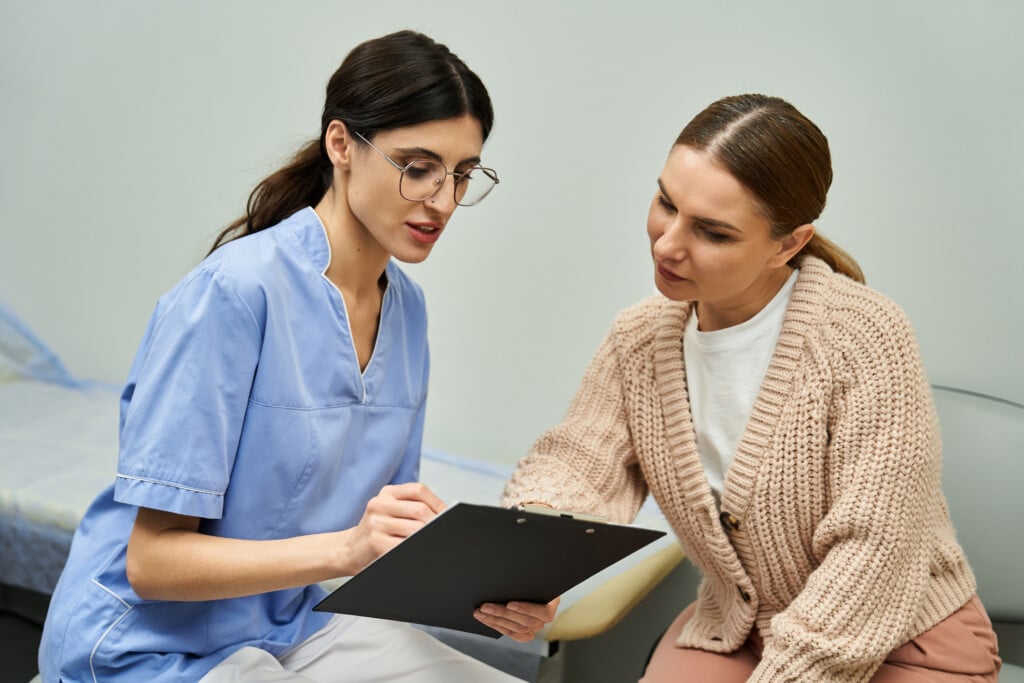 Gynecologist Consults With Patient