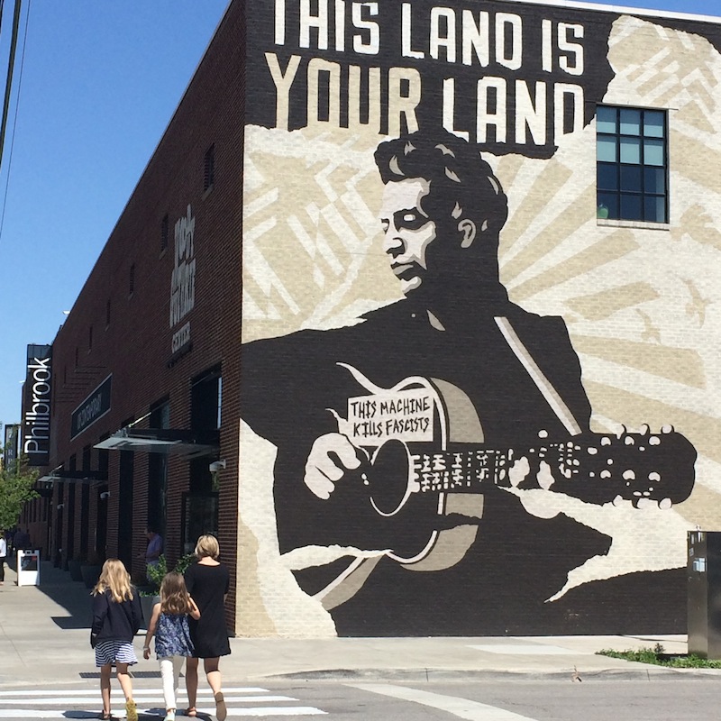 woody guthrie mural outside of the woody guthrie center