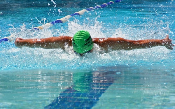 swimmer doing the butterfly stroke, for article on oklahoma olympians