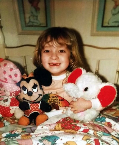 xennials concept. kristi roe owen as a young girl with stuffed animals