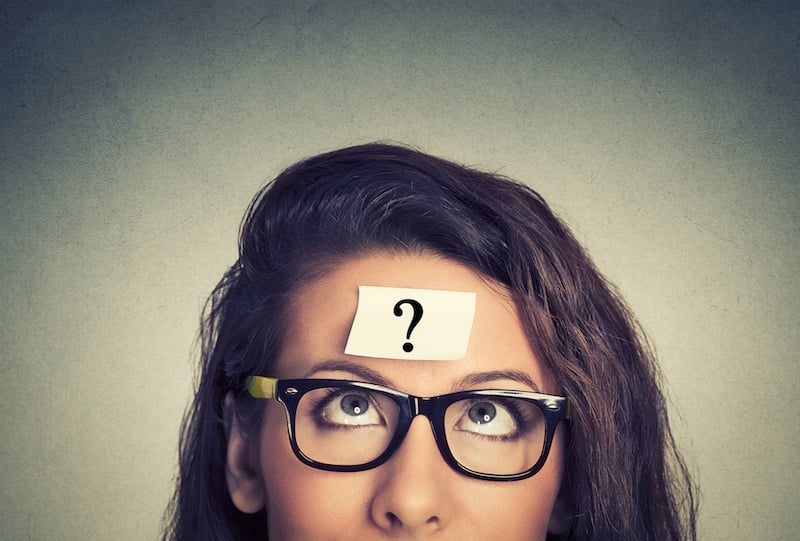 woman with question mark on her head, for article on dating after divorce