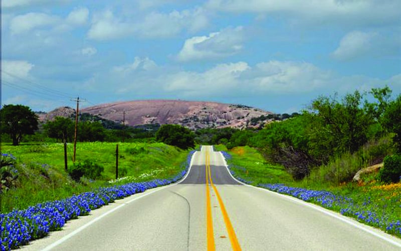 a road leading into texas hill country