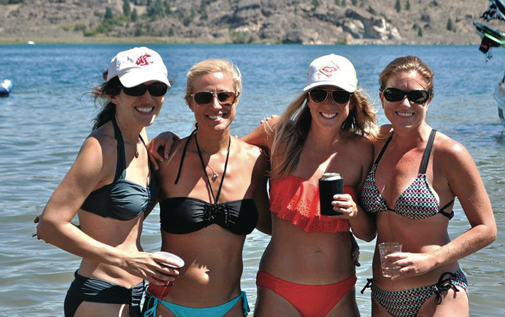 four women at lake on vacation, for article on annoying facebook posts