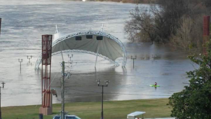 A photo of the flooded Riverwalk Amphitheatre in Montgomery.