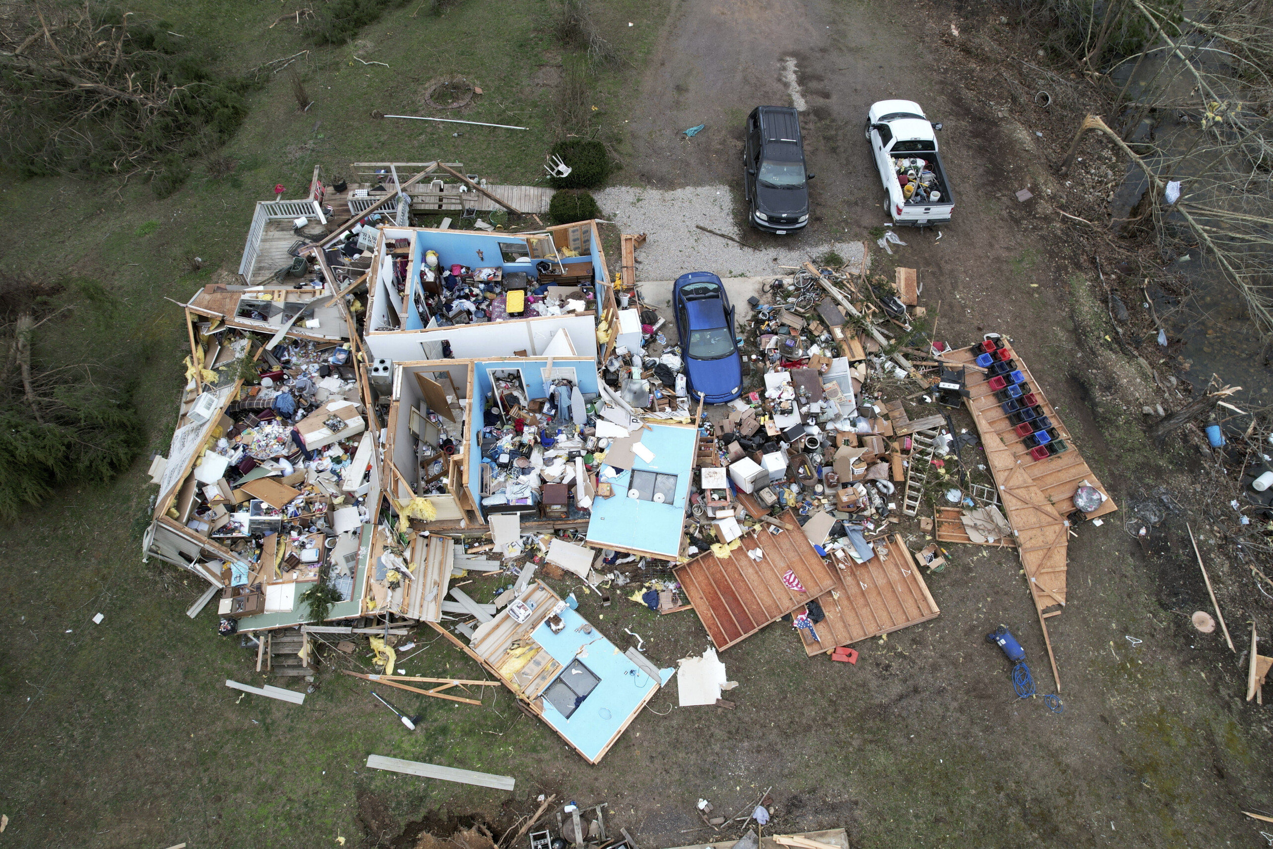 At least 32 dead across the country after storm system pushes