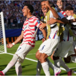 United States' Malik Tillman (17) celebrates with teammates after scoring on a free kick during the World Cup round of 32 soccer match on July 1, 2026. Martin Meissner /AP Photo