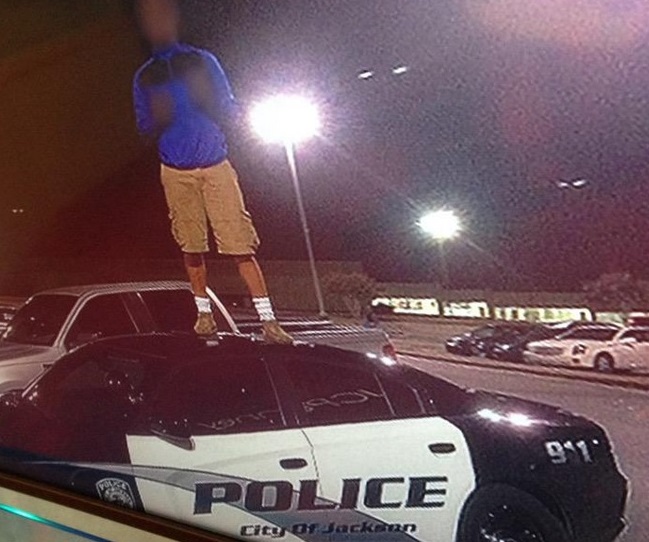 Jackson police charge juvenile on patrol car in photo with vandalism ...