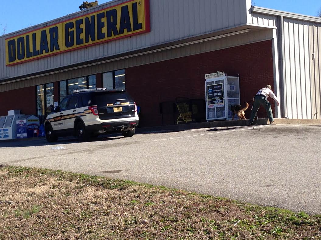 Officers search for suspect in armed robbery at Milan Dollar General