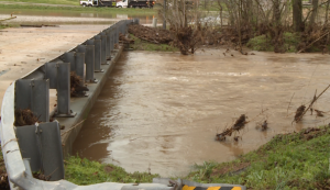 Water Flows Under A Hardin County Bridge Following Overnight Rain
