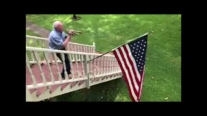 Dr. Alexander Plays "taps"