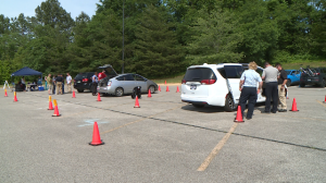 First Responders Check Car Seats For National Certification 1