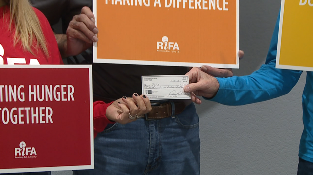 Check From Annual 5k Goes To Help Fight Hunger 1
