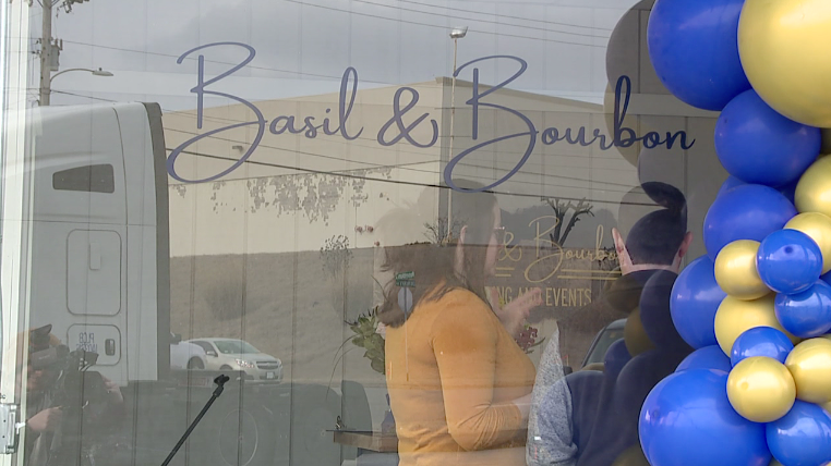 Ribbon Cutting Held For Basil And Bourbon 7