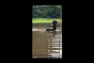Jpd Officer Rescues Dogs From Flood Waters 2