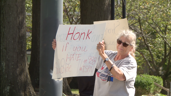 Volunteers Gather at Busy Intersections to Promote Suicide Awareness ...