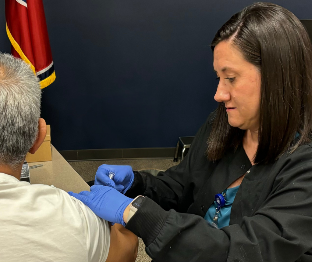 Nurse Gives Flu Shot