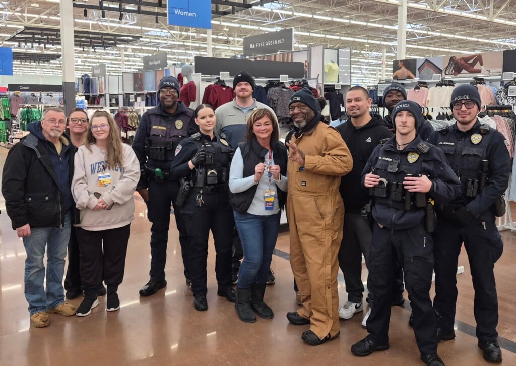 Police Chief Kelvin Evans presented an Acts of Kindness coin to Linda Osborne, Manager of Brownsville Walmart
