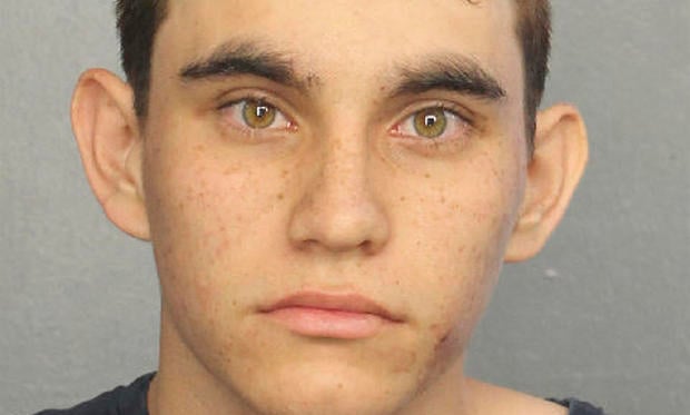 This photo provided by the Broward County Jail shows Nikolas Cruz.  Authorities say Cruz