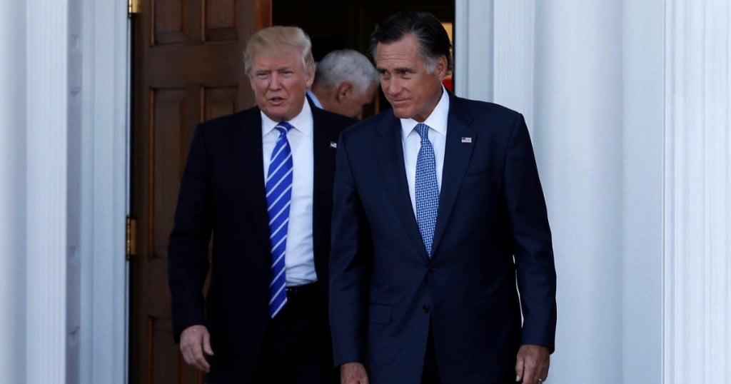 U.S. President-elect Donald Trump (L) and former Massachusetts Governor Mitt Romney emerge after their meeting at the main clubhouse at Trump National Golf Club in Bedminster