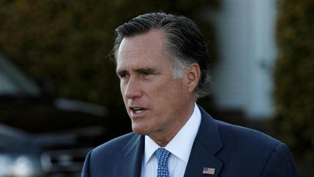 FILE PHOTO: Former Massachusetts Governor Mitt Romney speaks to members of the media after their meeting with U.S. President-elect Donald Trump at the main clubhouse at Trump National Golf Club in Bedminster