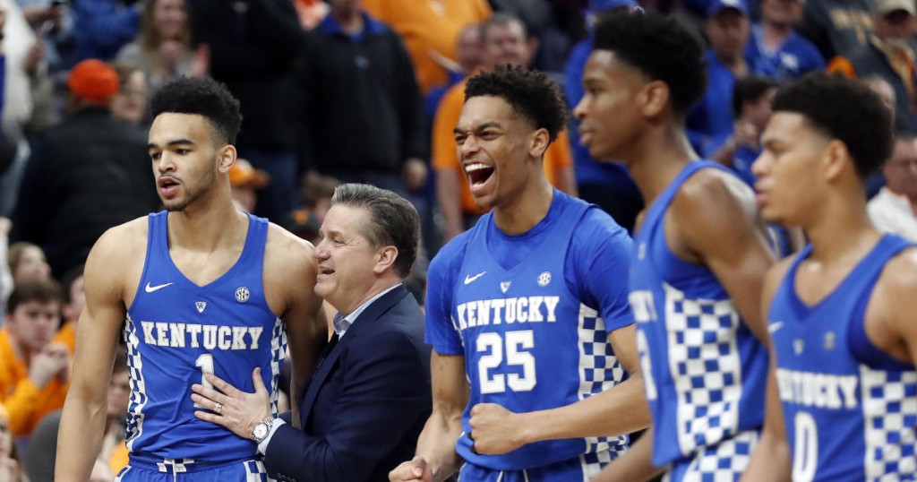 Kentucky head coach John Calipari congratulates forward Sacha Killeya-Jones (1) during the second half of an NCAA college basketball championship game against Tennessee at the Southeastern Conference tournament Sunday