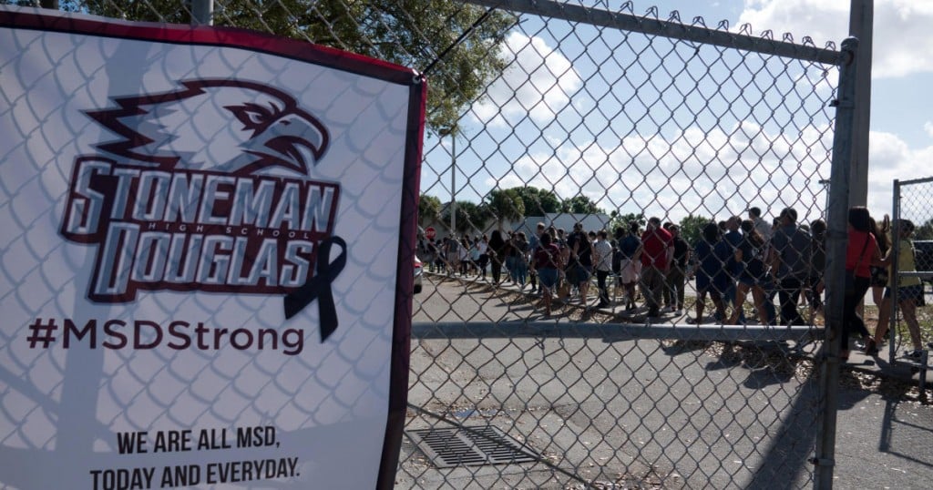 Students and parents arrive for voluntary campus orientation at the Marjory Stoneman Douglas High School