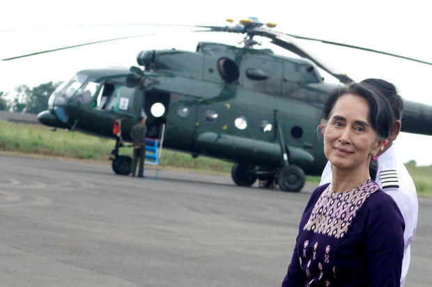 Myanmar's de facto leader Aung San Suu Kyi arrives at Sittwe airport after visiting Maungdaw in the state of Rakhine November 2