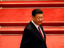 Chinese President Xi Jinping arrives for the opening session of the National People's Congress (NPC) at the Great Hall of the People in Beijing