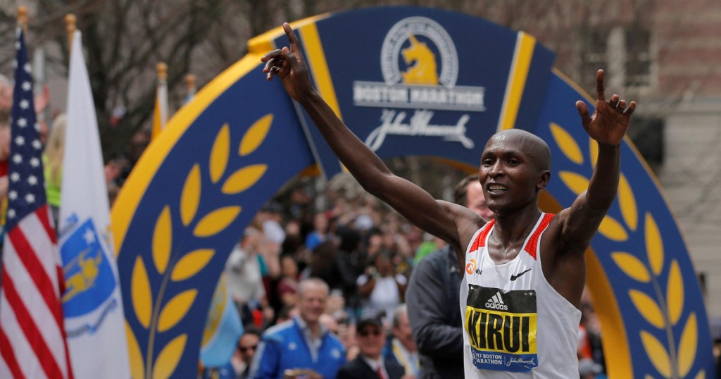 FILE PHOTO: Geoffrey Kirui of Kenya crosses the finish line to win the men's division of the 121st Boston Marathon in Boston