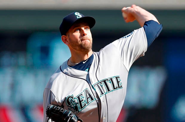 Seattle Mariners pitcher James Paxton throws against the Minnesota Twins in the first inning of a baseball game Thursday