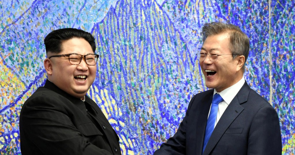 South Korean President Moon Jae-in shakes hands with North Korean leader Kim Jong Un during their meeting at the Peace House at the truce village of Panmunjom inside the demilitarized zone separating the two Koreas