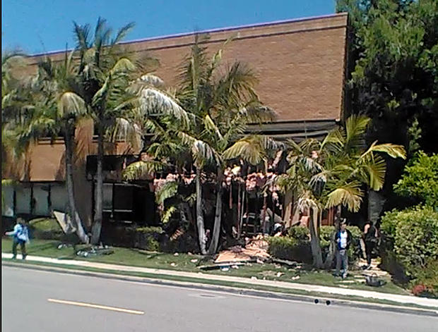 This image taken from cellphone video shows a building after a fatal explosion in Aliso Viejo