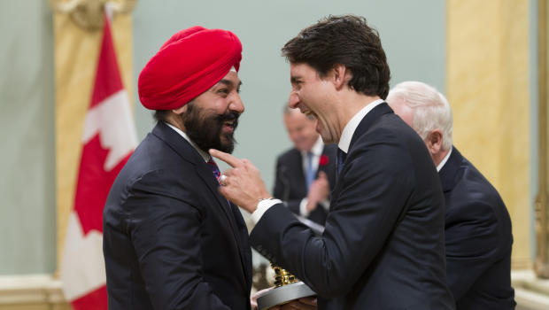 Prime Minister Justin Trudeau jokes with Minister of Innovation
