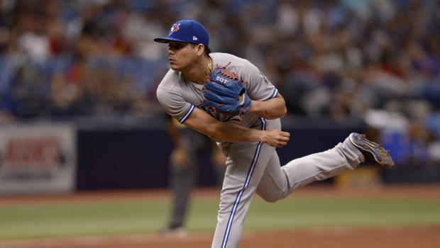 Toronto Blue Jays relief pitcher Roberto Osuna (54) throws a pitch during the ninth inning of a baseball game against the Tampa Bay Rays Sunday