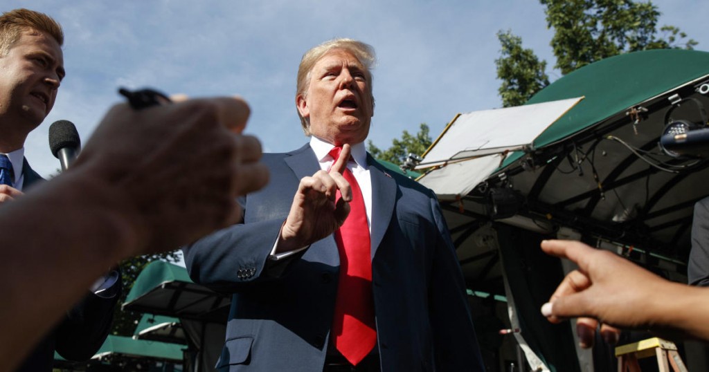 President Donald Trump speaks to reporters on the North Lawn of the White House