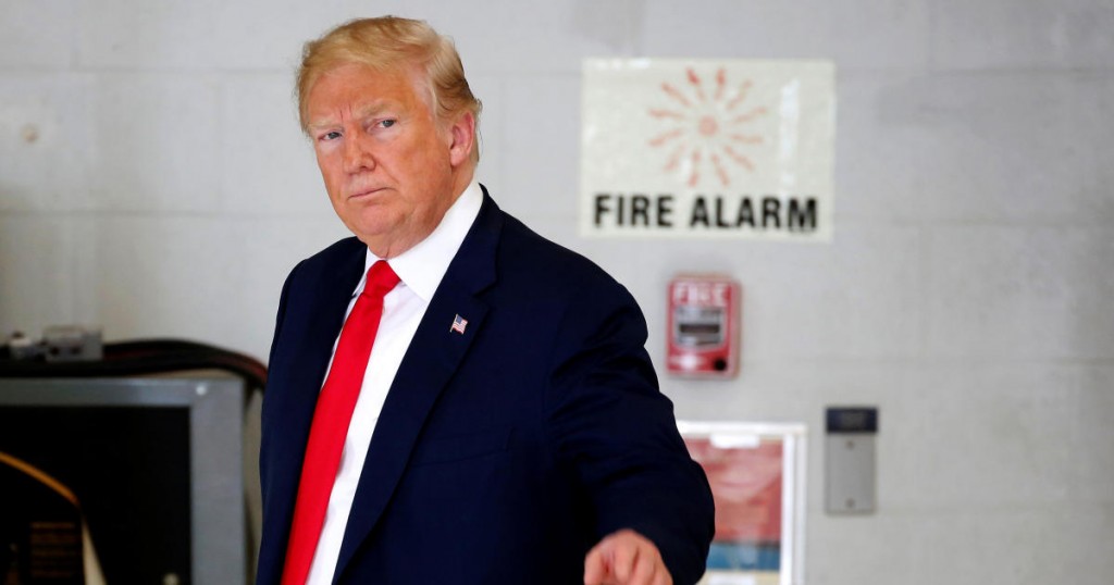 U.S. President Donald Trump walks from a meeting with families of the Santa Fe