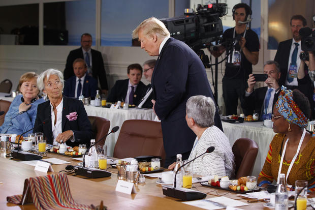 President Donald Trump arrives for a Gender Equality Advisory Council breakfast during the G-7 summit