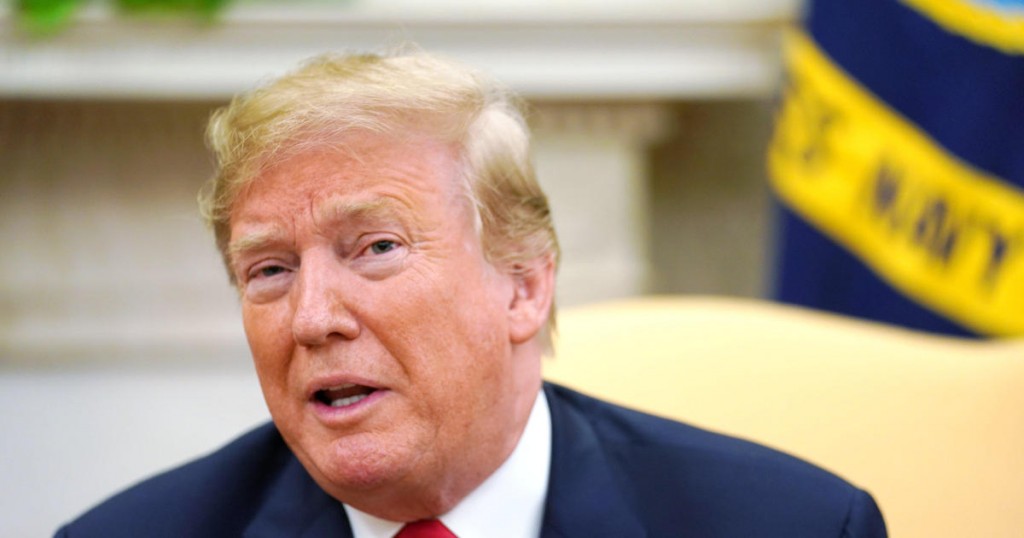 U.S. President Donald Trump speaks to reporters as he meets with Portugals President Rebelo de Sousa in the Oval Office at the White House in Washington