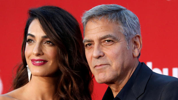 FILE PHOTO: Director George Clooney and his wife Amal attend the premiere for "Suburbicon" in Los Angeles