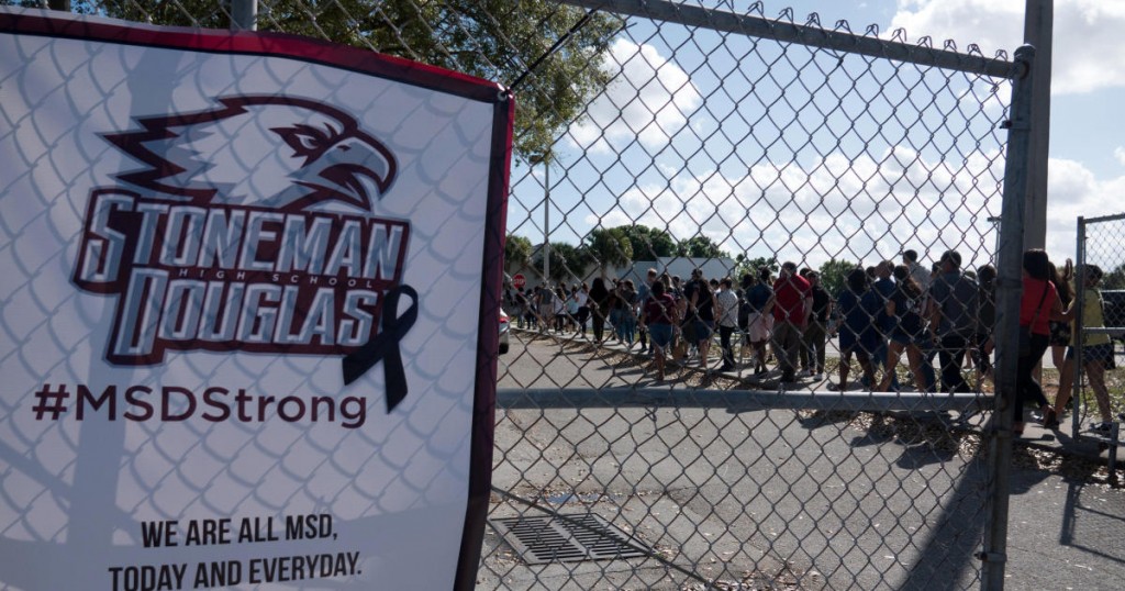 Students and parents arrive for voluntary campus orientation at the Marjory Stoneman Douglas High School