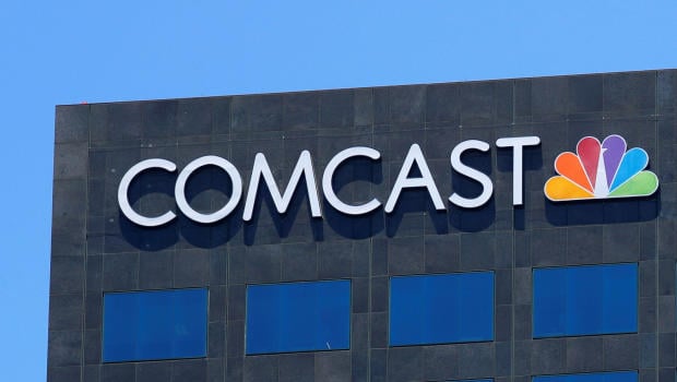 The Comcast NBC logo is shown on a building in Los Angeles