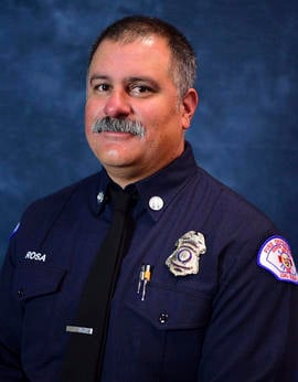 This photo provided by the Long Beach Fire Department shows Captain David Rosa who was fatally shot while responding to  an emergency at a senior home on Monday