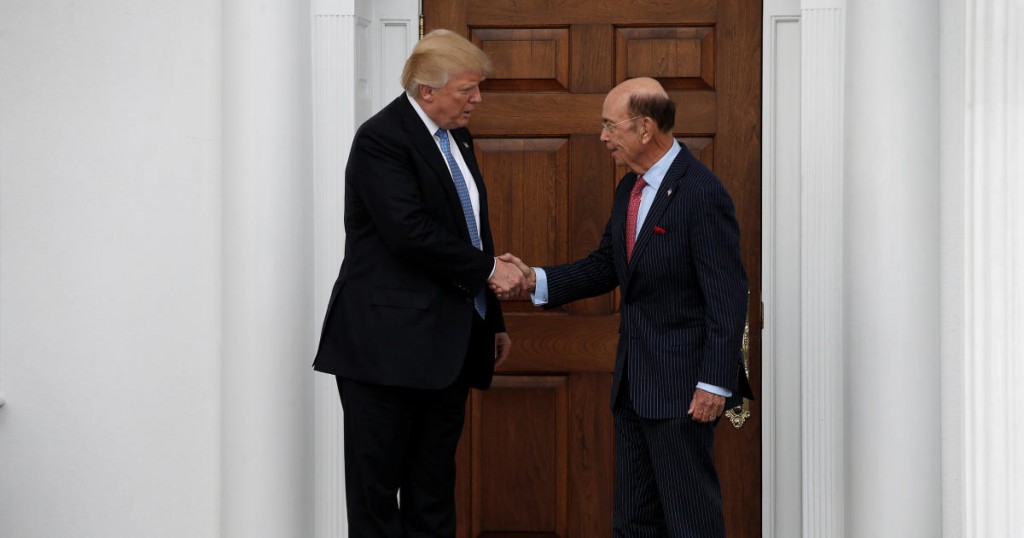 U.S. President-elect Donald Trump shakes hands with Wilbur Ross after their meeting at Trump National Golf Club in Bedminster