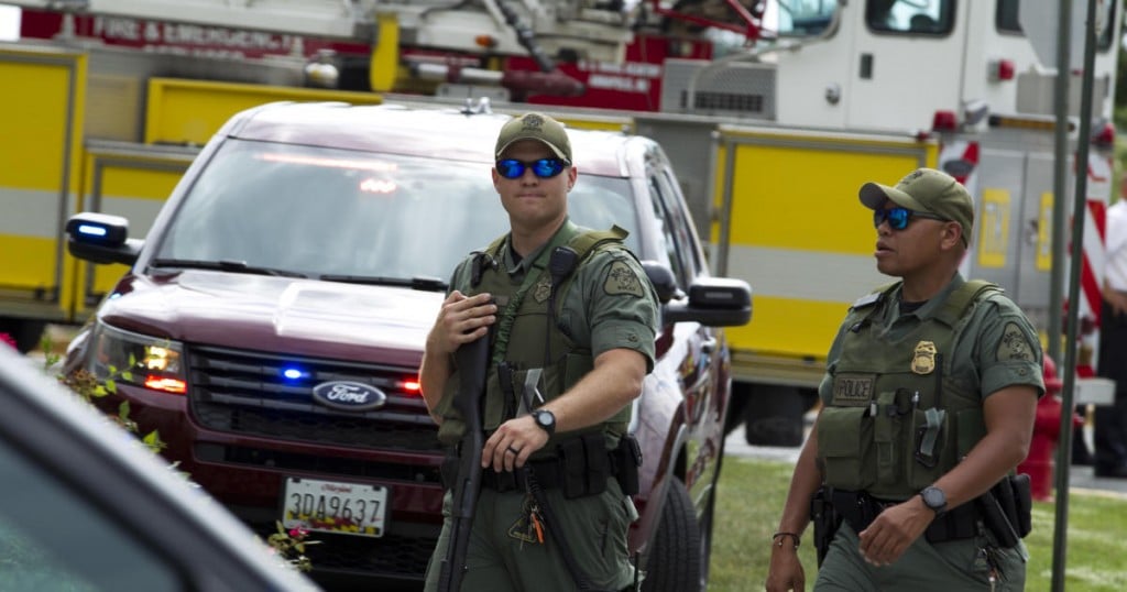 Maryland police officers patrol the area after multiple people were shot at at The Capital Gazette newspaper in Annapolis